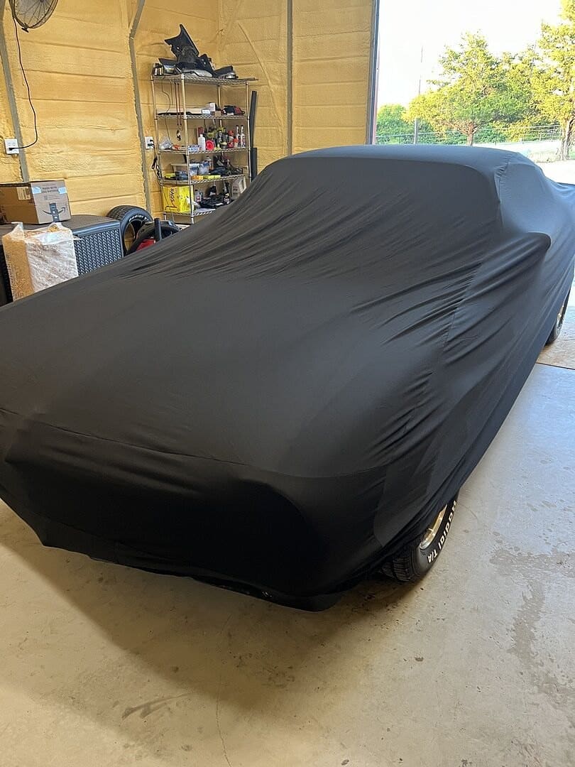Rodney S.'s vehicle under its cover, from their review.