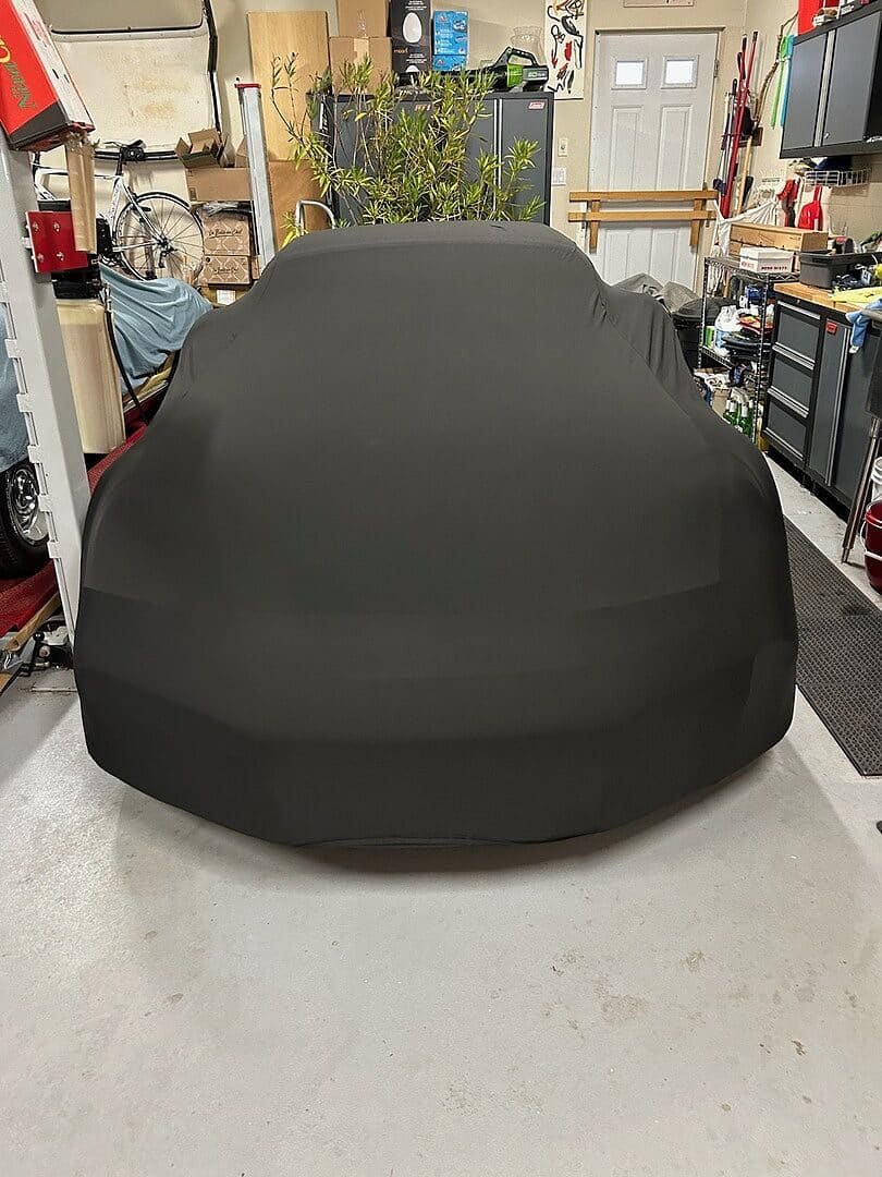 Steve P.'s vehicle under its cover, from their review.