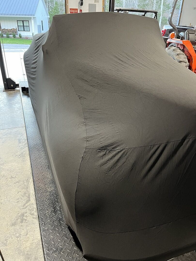 patrick m.'s vehicle under its cover, from their review.