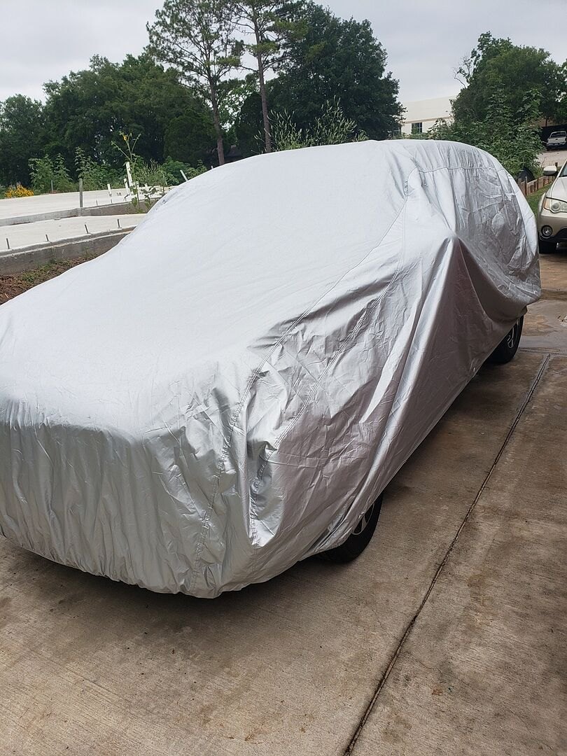 A customer's SUV under its CarCovers cover