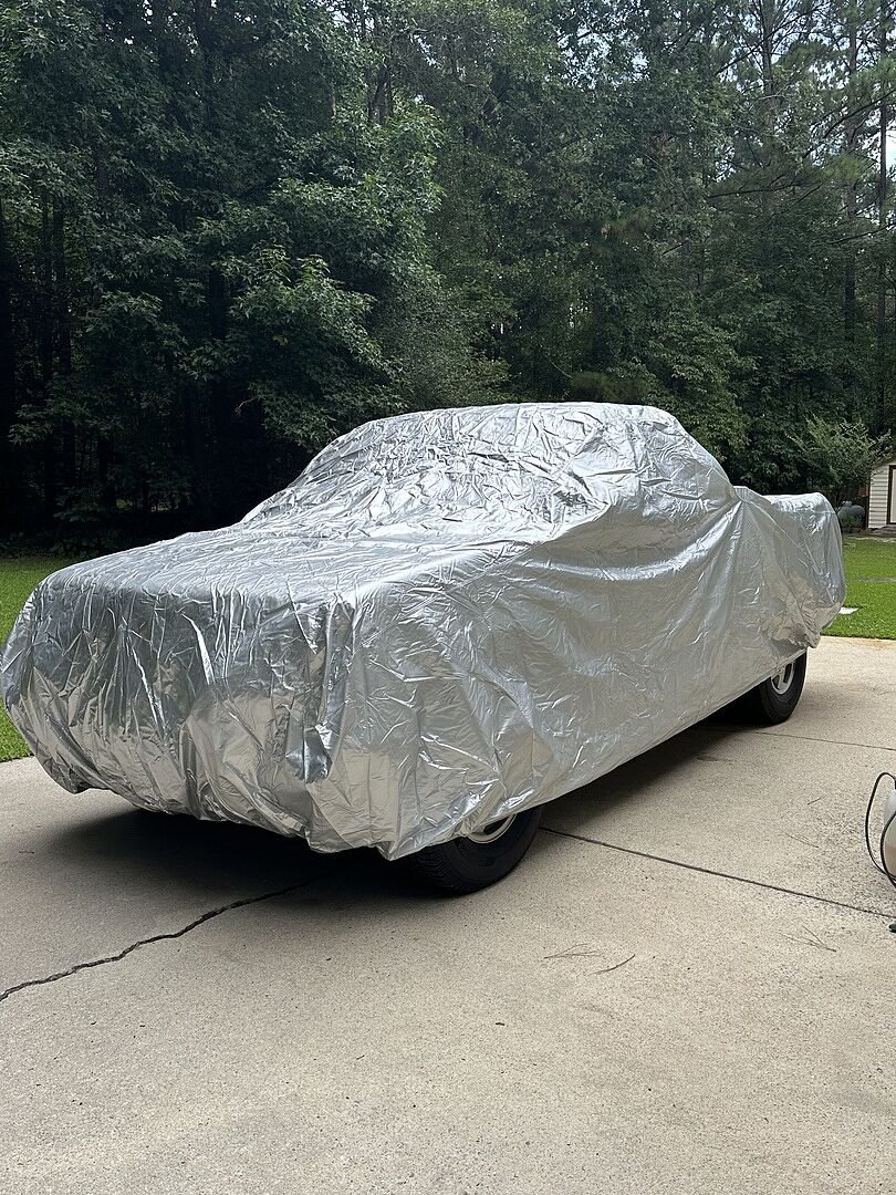 A customer's truck under its CarCovers cover