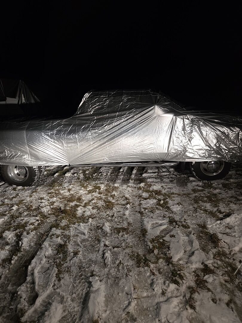 A customer's truck under its CarCovers cover